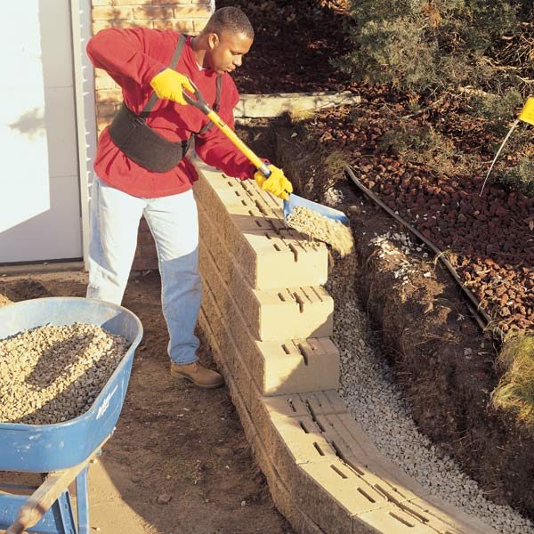 how to build a concrete block retaining wall the family