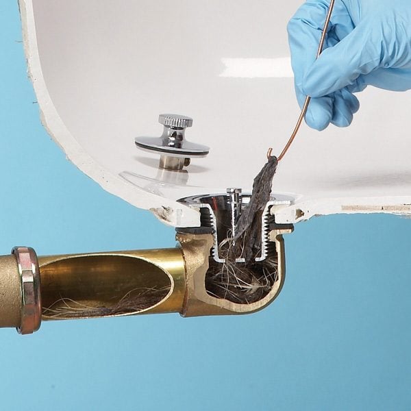 unclog clogged drains gunk removing causes problem clog clogs stoppers frustrating handyman familyhandyman