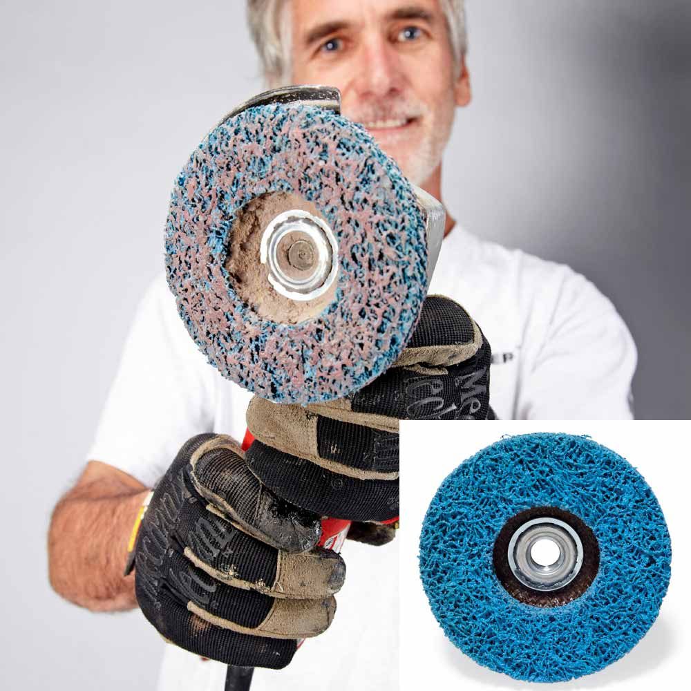 Man holding a Norton Rapid Paint Removal Wheel | Construction Pro Tips
