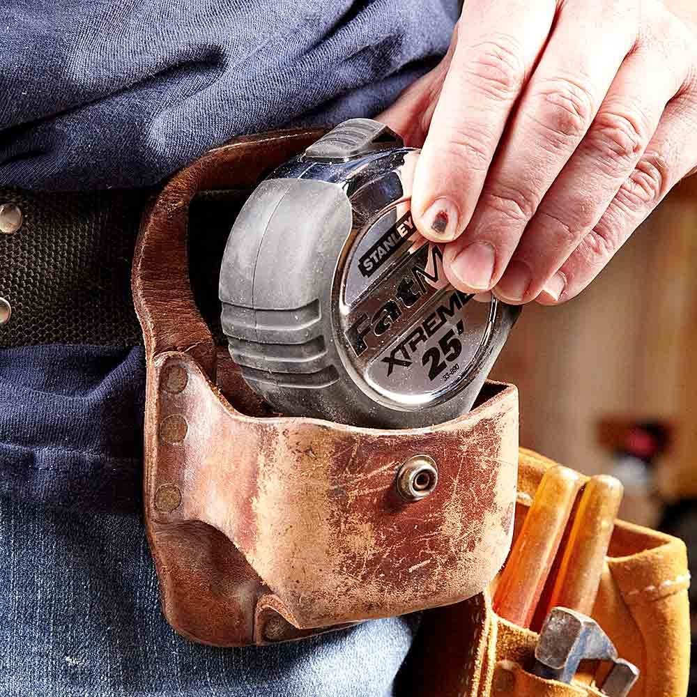 A large holster made for an over-sized tape | Construction Pro Tips