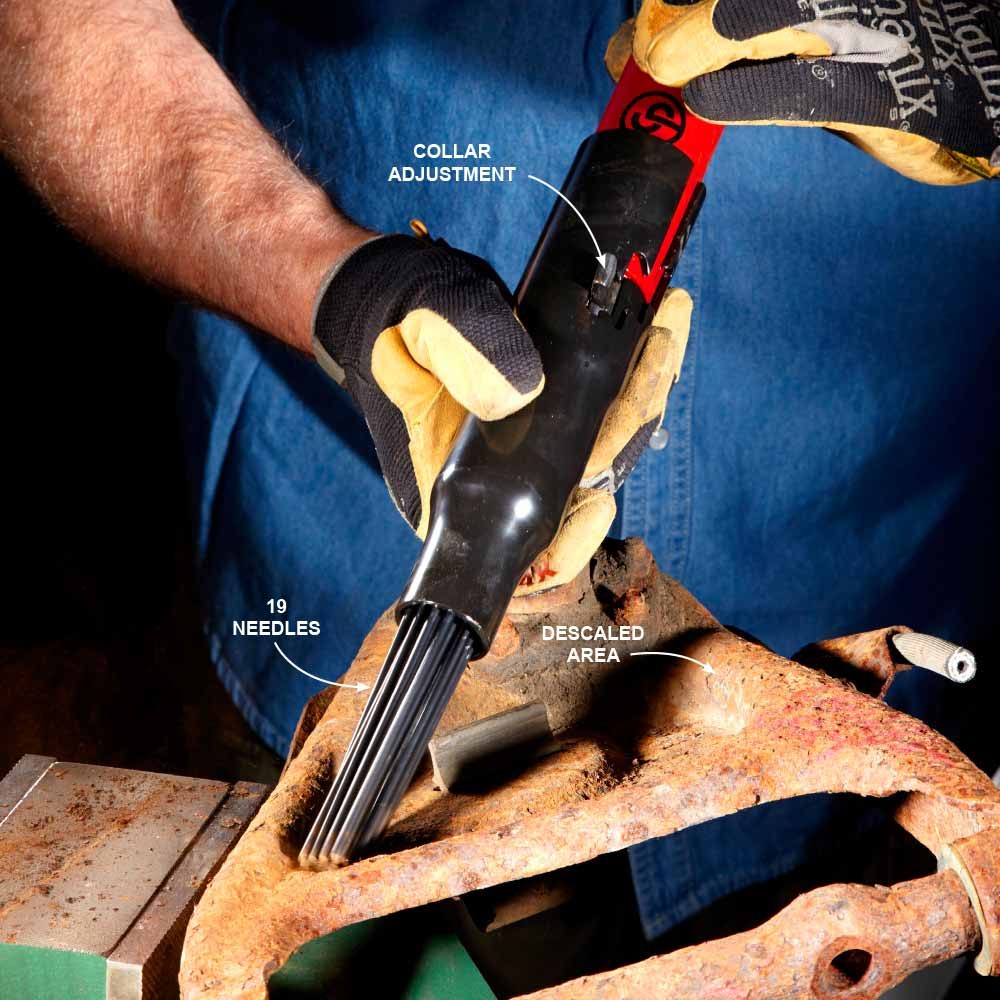 Needle Scaler blasting off rust | Construction Pro Tips