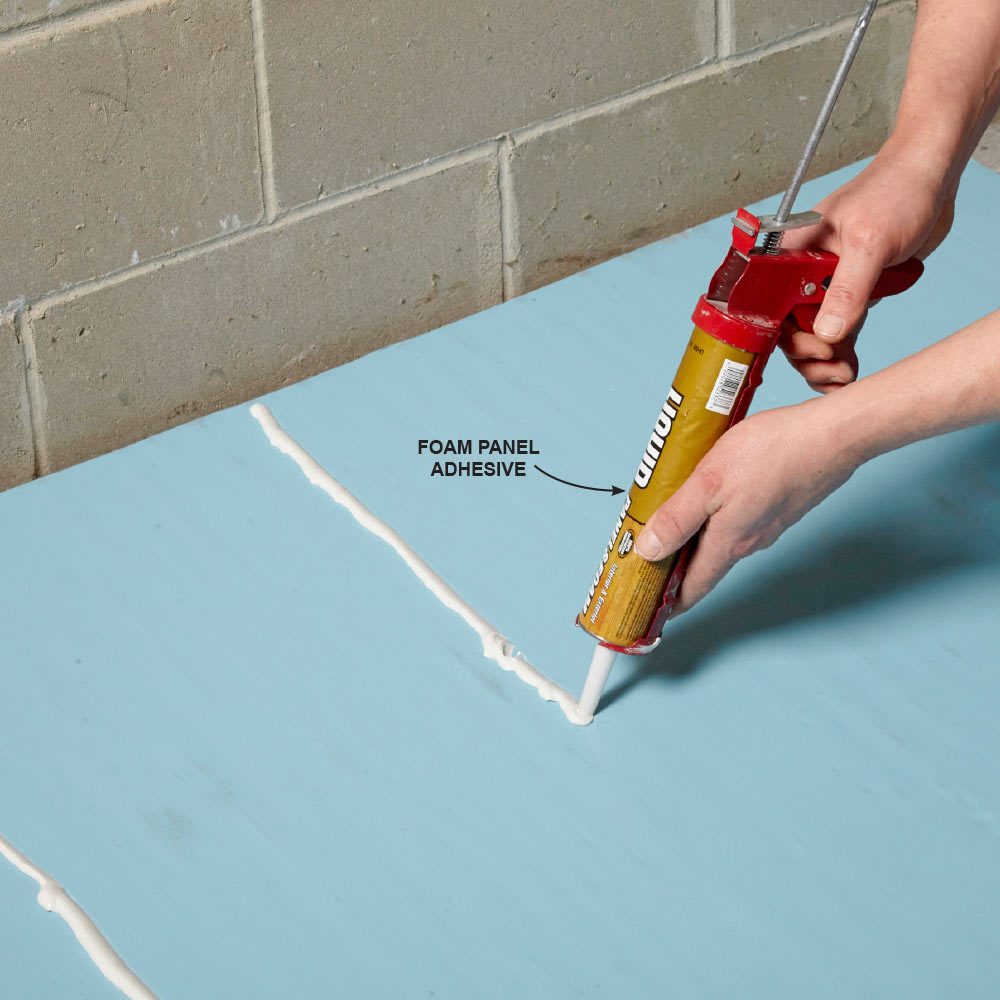 Applying adhesive to a foam panel | Construction Pro Tips
