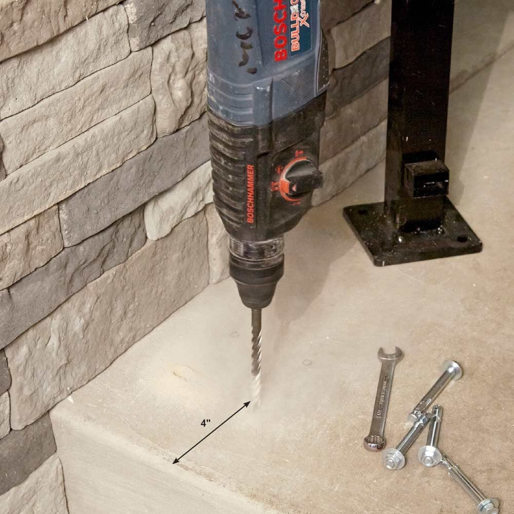 Drilling into concrete an appropriate distance from the edge | Construction Pro Tips