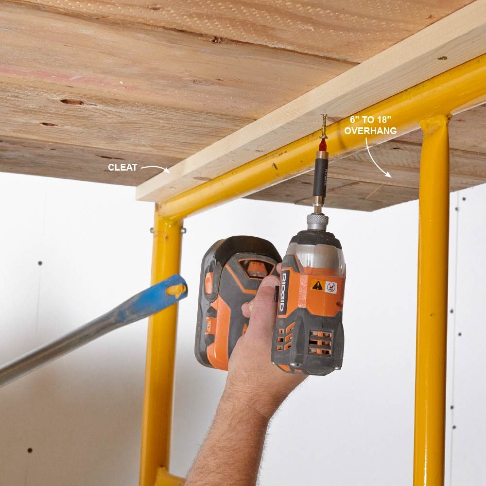 Drilling through scaffolding into wooden planks | Construction Pro Tips