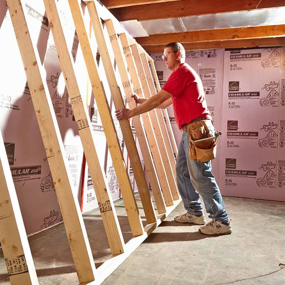 Putting pre-assembled walls in place | Construction Pro Tips