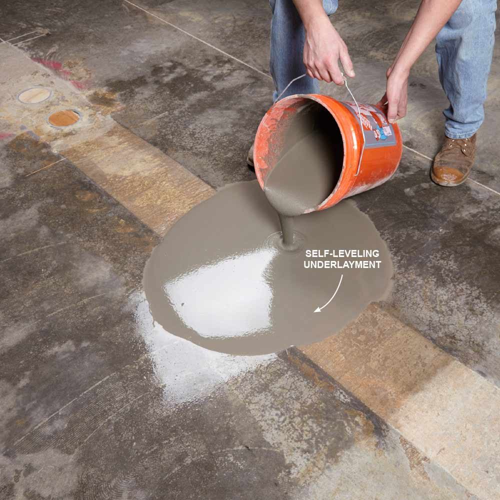 Pouring self-leveling underlayment onto the floor | Construction Pro Tips