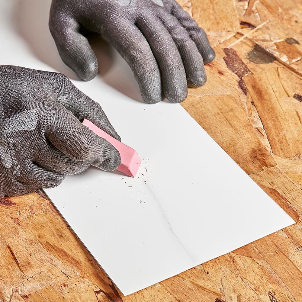 Erase marks on metal with an eraser | Construction Pro Tips