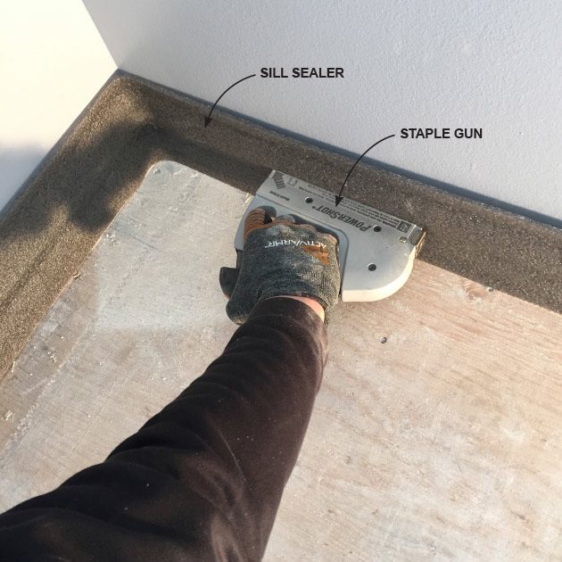 Installing sill sealer at the walls | Construction Pro Tips