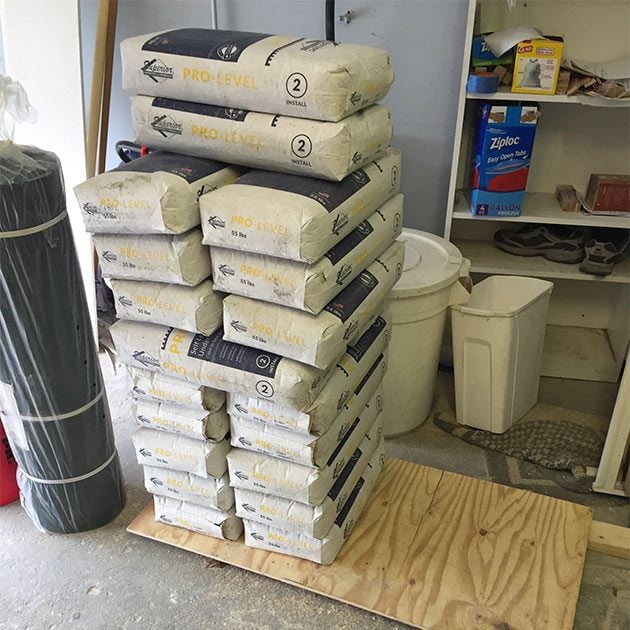 A stack of bagged self-leveler | Construction Pro Tips