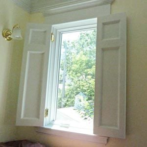 Install shutters on south-facing windows