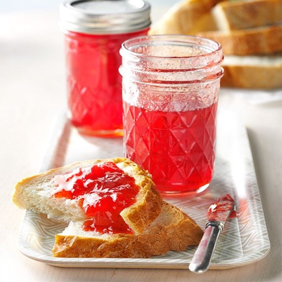 Fresh strawberry freezer jam on a slice of bread